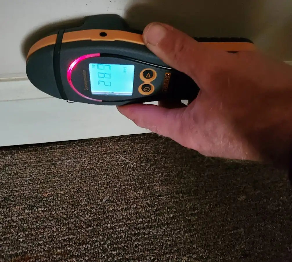 Moisture detection at baseboard during Burst Pipe Cleanup in Aberdeen